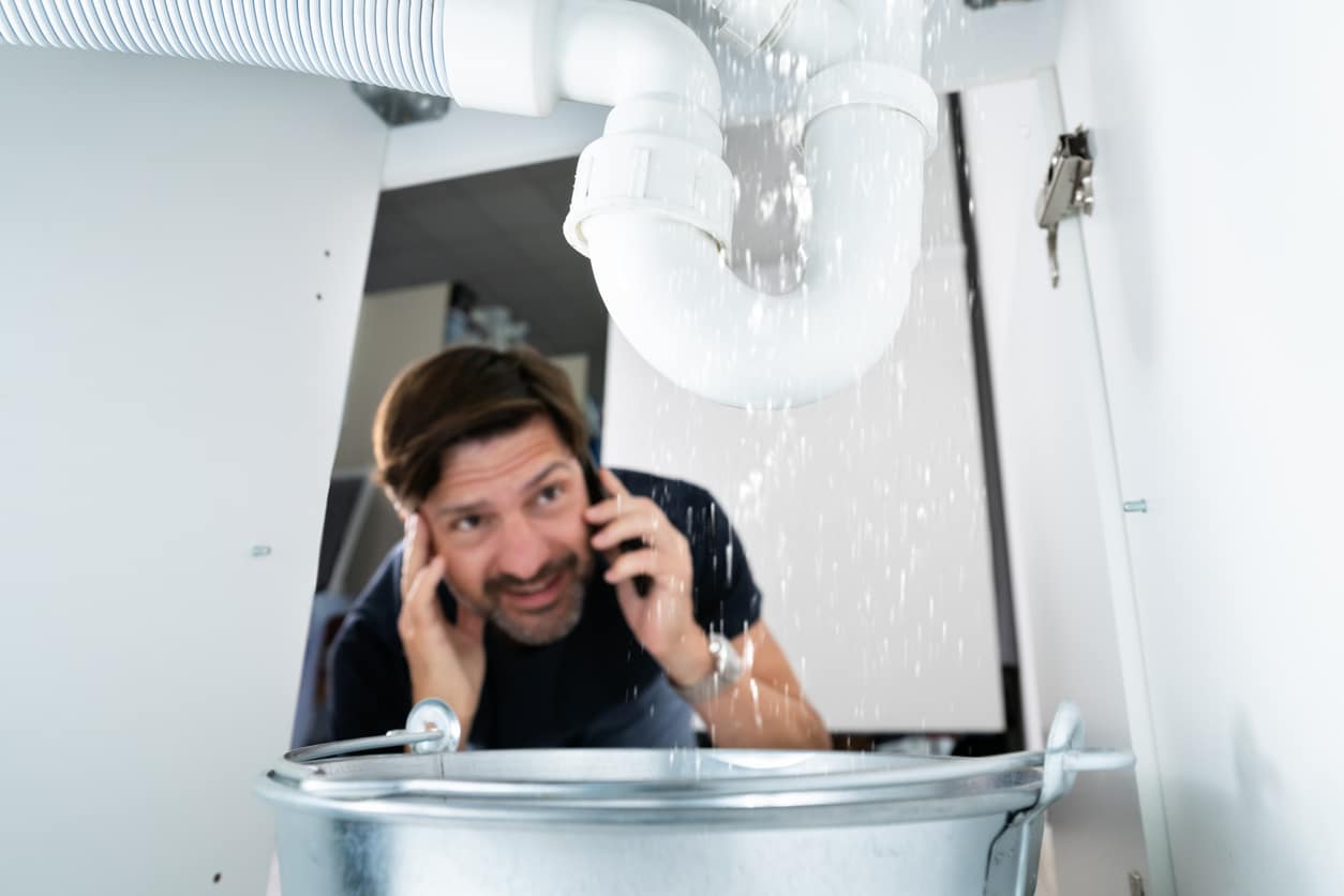 a person standing in front of a mirror posing for the camera